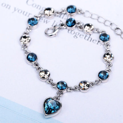 Betoverende Oceaanhart Kristalarmband met Stralende Blauwe Hartbedel