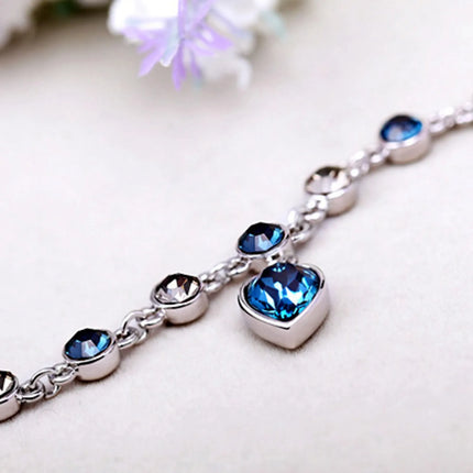 Betoverende Oceaanhart Kristalarmband met Stralende Blauwe Hartbedel