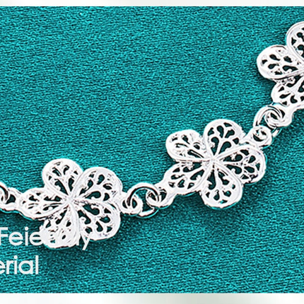 Elegante Zilveren Filigraan Armband met Unieke Schakels
