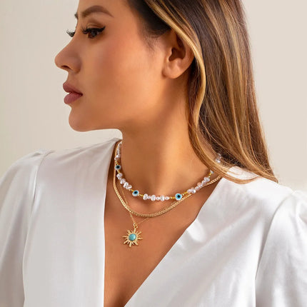 EthnoCharm Necklace Set – Zonnebloem & Boze Oog Accessoires