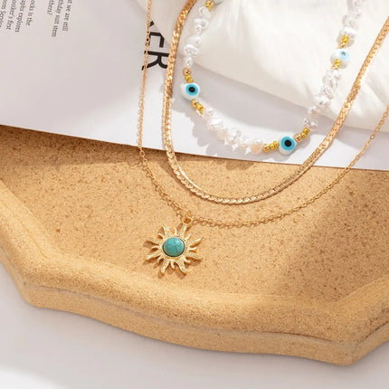 EthnoCharm Necklace Set – Zonnebloem & Boze Oog Accessoires