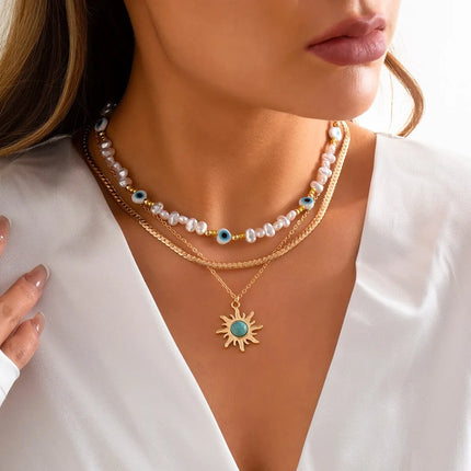EthnoCharm Necklace Set – Zonnebloem & Boze Oog Accessoires