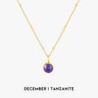 December | Tanzaniet / Goud