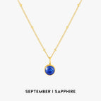September | Saffier / Goud